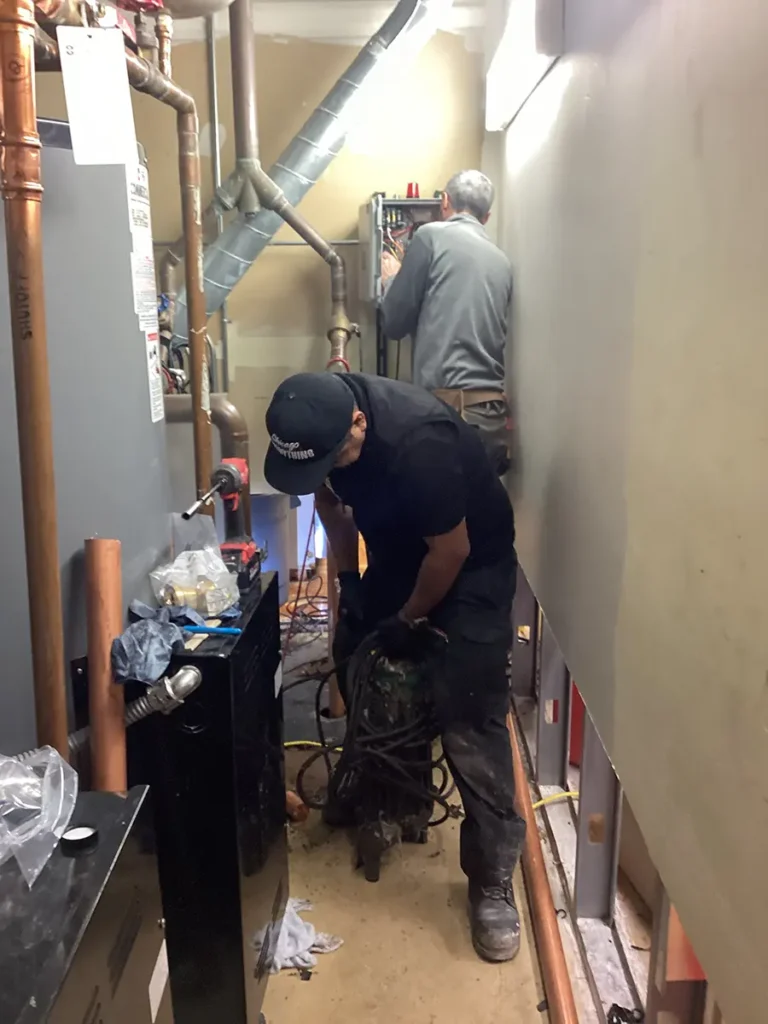 plumber near me servicing electric hot water heater