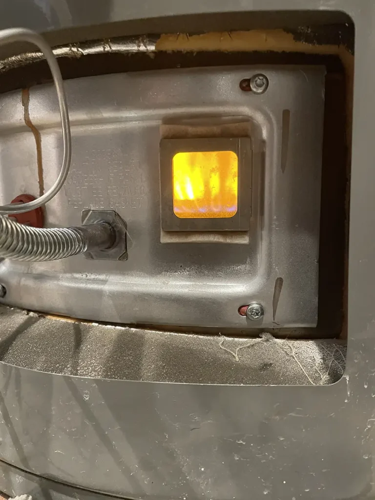 igniter near circuit breaker in gas water heater